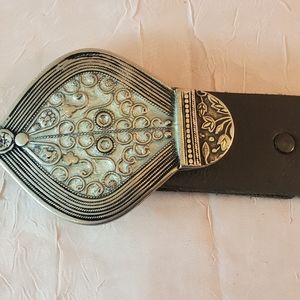 Black leather belt w/ ornate oval silver buckle